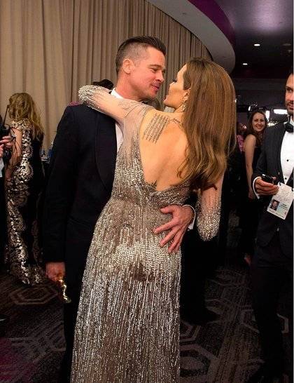 brad-pitt-angelina-jolie-celebrate-backstage-oscar-2014-rex_GA
